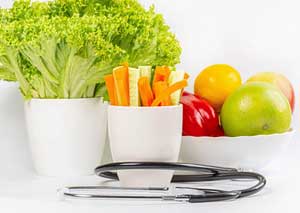 Fresh vegetables and a stethoscope